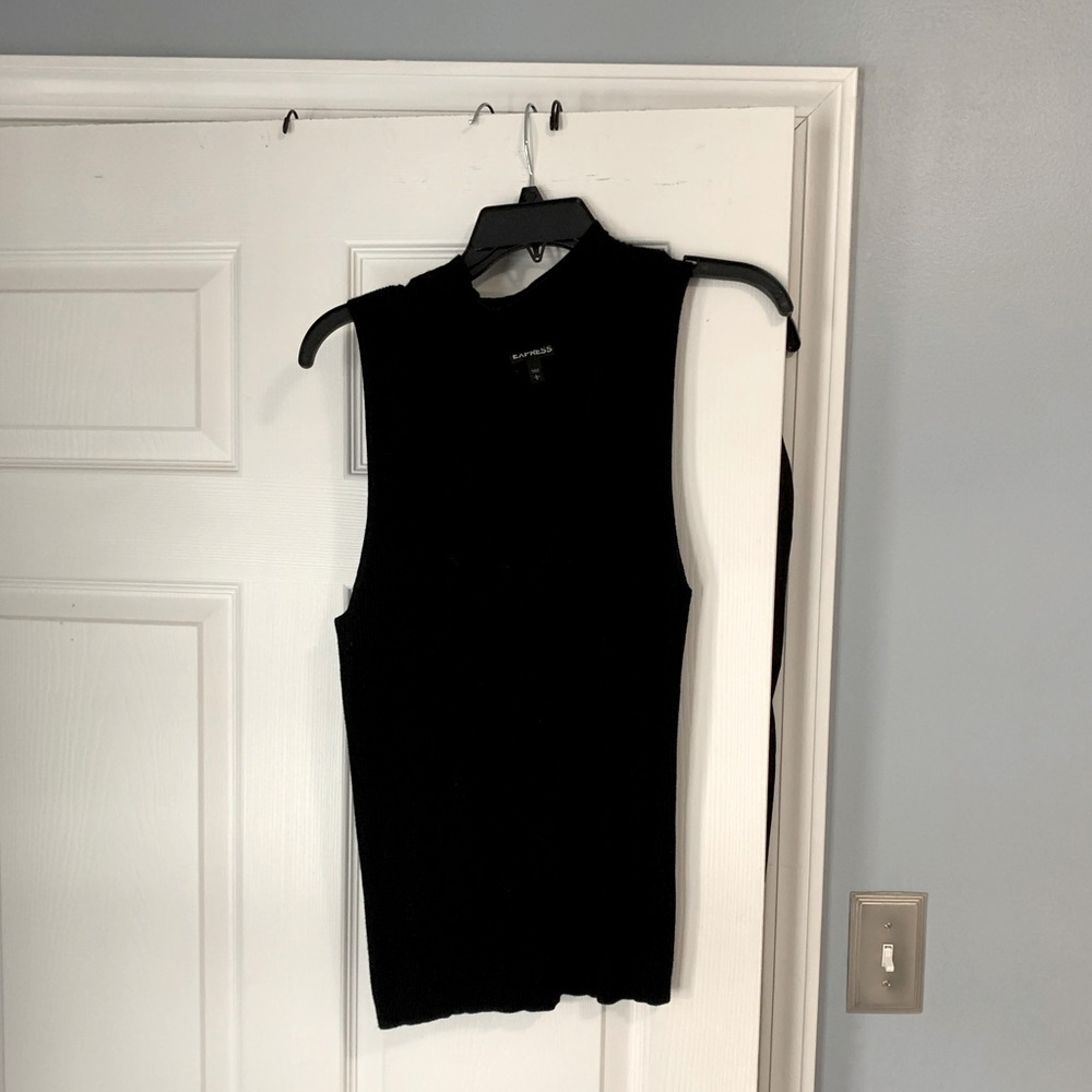 Very flattering black turtle neck with V shape cut out!